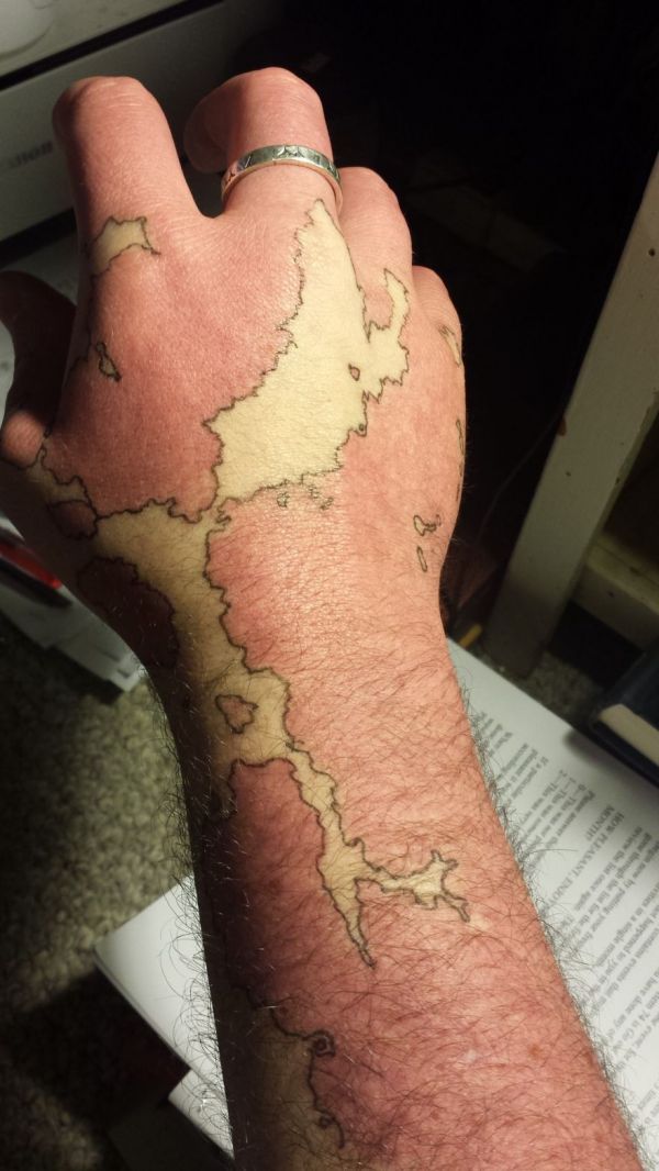 this-man-turned-his-birthmark-into-a-map-of-an-imaginary-world-neatorama