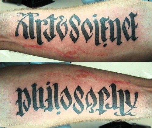 Typographer John Langdon designed this tattoo that says “art & science” from 