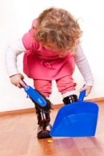 little girl helping