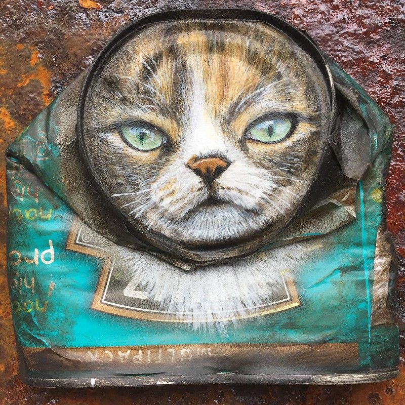 Artist Brings Discarded Cans Alive with Faces